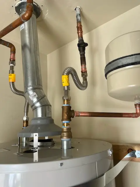 Water heater installation and plumbing repair in Little Central America